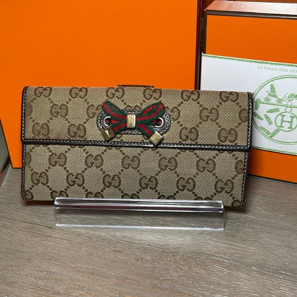 Gucci Handbags - Gucci Brown and Black Wallet with Red and Green Bow